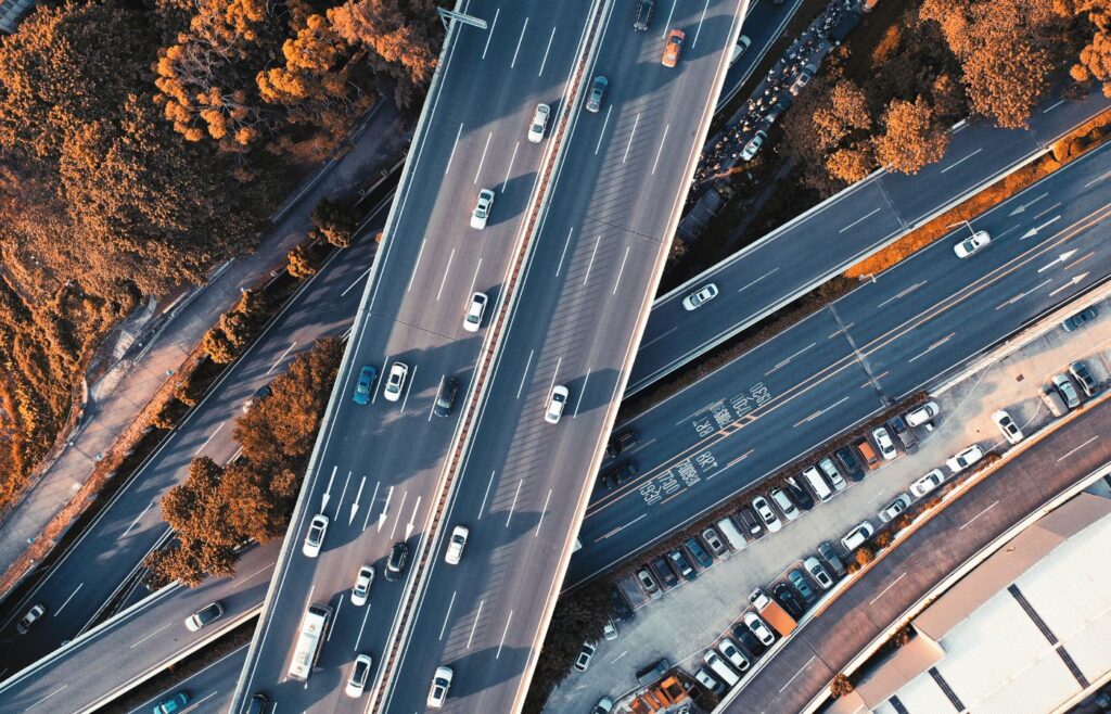 shows a birds eye view of traffic on a road - insurance content marketing