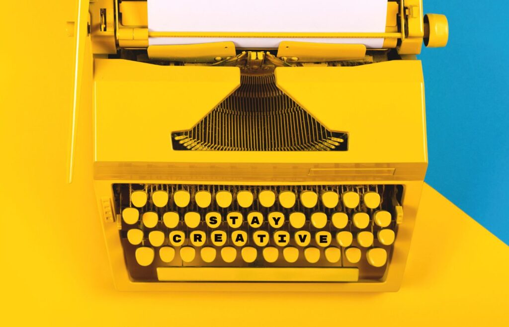Shows a bright yellow typewriter