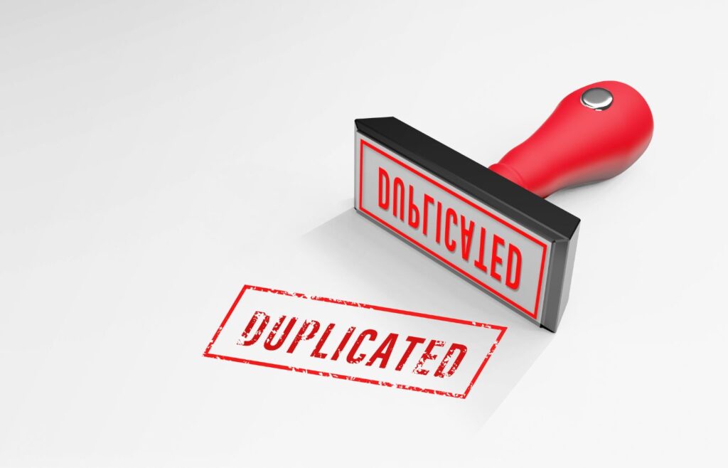 Duplicate content guide - Shows a stamp illustration with the word 'duplicated'