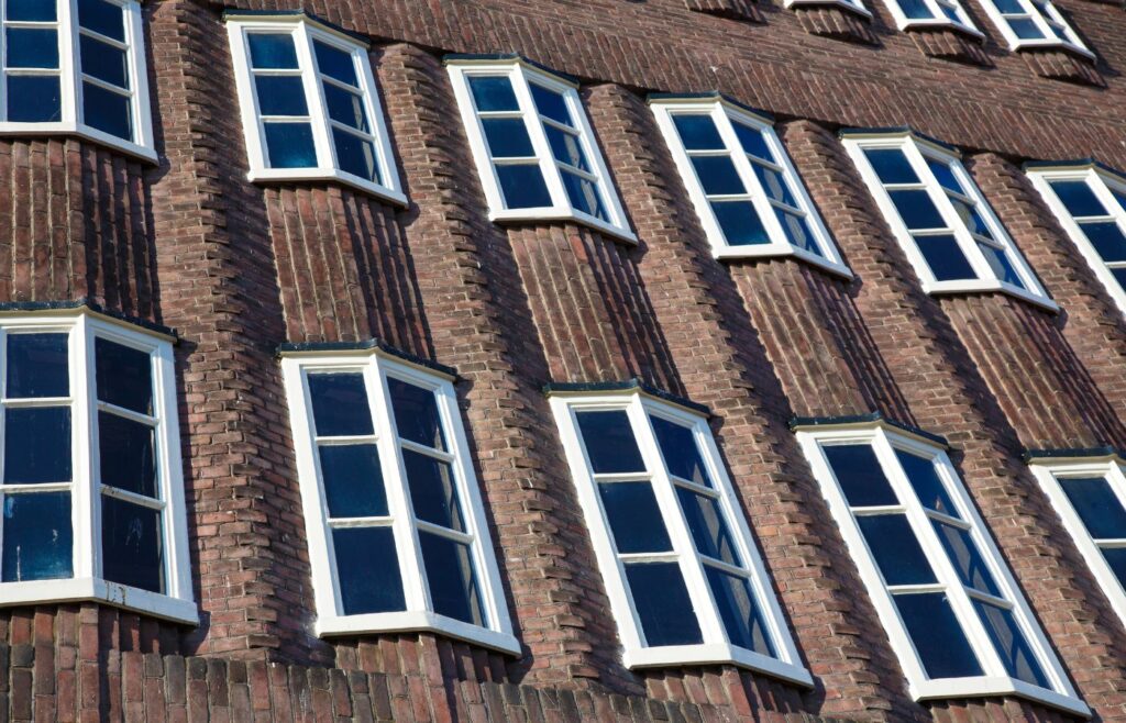 A series of abstract windows on a building