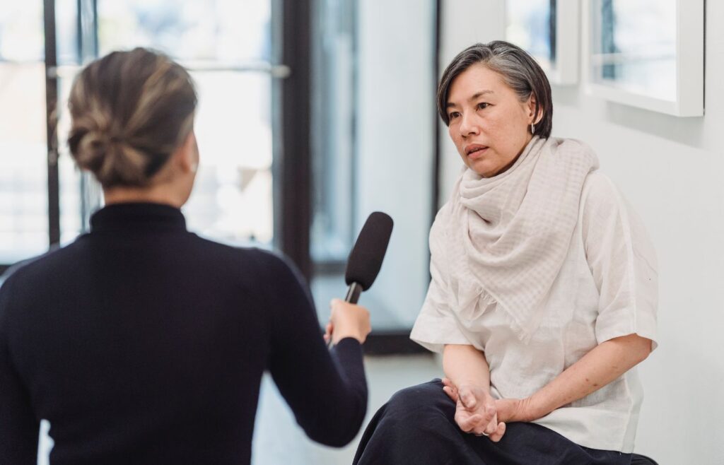 shows a woman being interviewed 