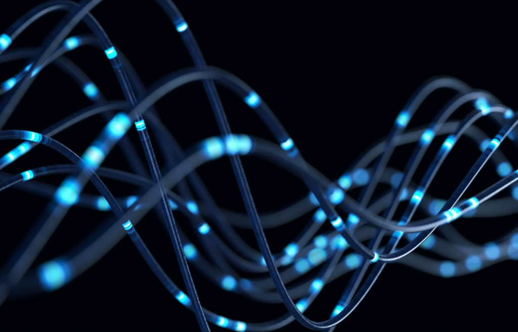 shows blue wires in front of a black background - B2B blog topic idea