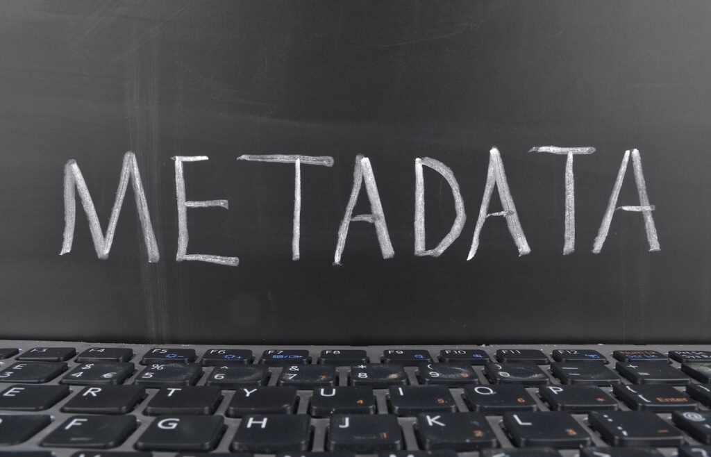 shows a black board with the word, 'METADATA' 