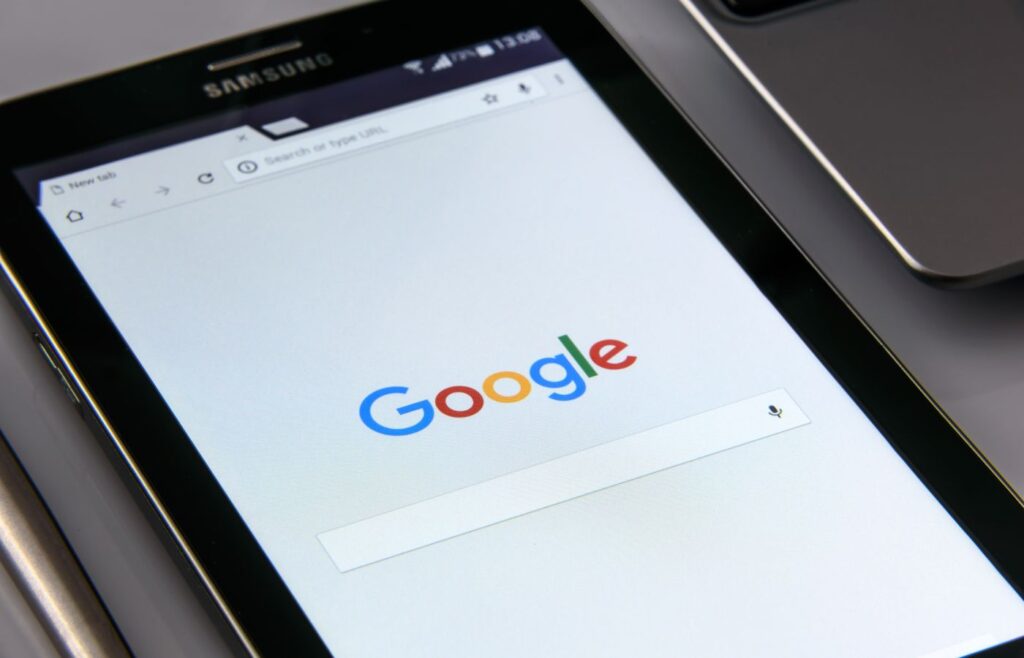 shows a tablet with the Google homepage - SaaS copywriting guide 